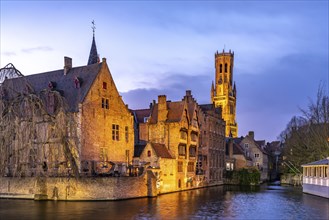 Rozenhoedkaai canal with belfry at dusk, Bruges, Belgium, Europe