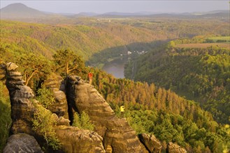 View of the Schrammstein in the Elbe Sandstone Mountains Looking upstream from the Elbe. Leisurely