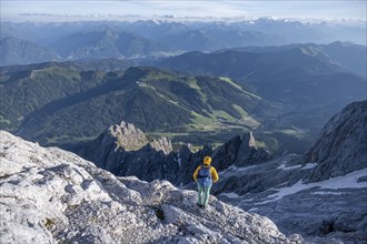 Hiker Looking down into the valley from the Hochkönig, Salzburger Land, Austria, Europe