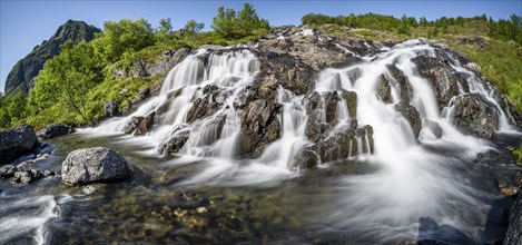 Lofoten waterfall on the hiking trail to Munkebu hut, long exposure, Moskenesoya, Lofoten,