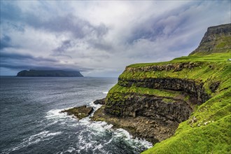 Huge cliffs in Gasadalur, Vagar, Faroe islands, Denmark, Europe