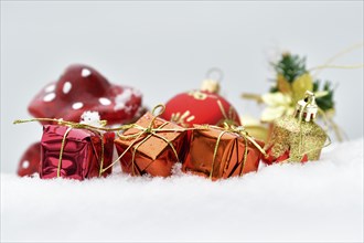 Christmas decorations, Christmas presents lie in the snow