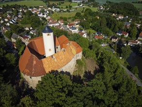 Schönfels Castle with the newly renovated keep (castle tower) . Schönfels Castle is a typical