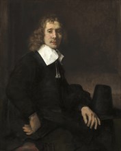 Young Man Seated at a Table, possibly Govaert Flinck, A Young Man Seated at a Table, possibly