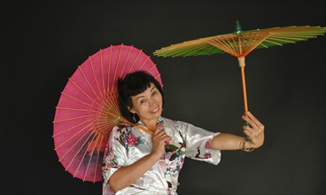 Asian dance with umbrellas