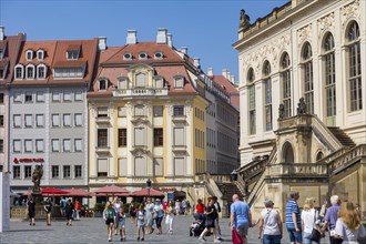 Tourists stroll across the Neumarkt in Dresden