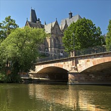 Pedal boat on the river Lahn with the Old University and the Weidenhäuser Bridge, Marburg, Hesse,