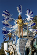 Colourful costumed, pretty women are dancing. Carnival. Mindelo. Cabo Verde. Africa