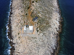 Drone shot, Akrotiri Tenaro lighthouse at the southernmost point of the Peloponnese, Cape Matapan,