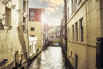 View of an Amsterdam canal at sunset