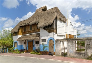 Unusual thatched palm house, Bacalar, Quintana Roo, Yucatan Peninsula, Mexico, Central America