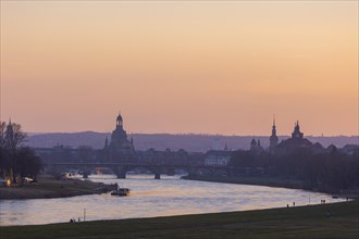 Evening sky over the old town of Dresden with the Church of Our Lady, the castle tower, the