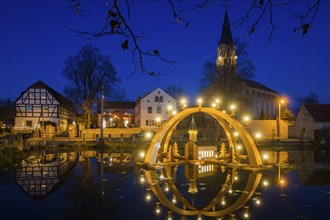 Floating candle arch in the village pond of Bärnsdorf near Moritzburg. The arch is 4.5m high,