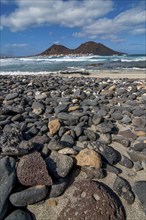 Vulcanic cone and beach with pebbles. San Vincente. Cabo Verde. Africa