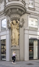 Sculpture on a baroque façade of a historic building, Vienna, Austria, Europe