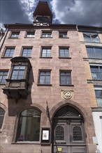 Historical chörlein and house sign from 1777, an earlier house numbering 1563, Füll 12, Nuremberg,