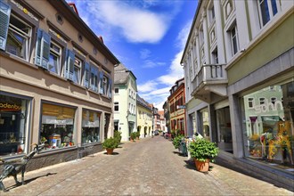 Ladenburg, Germany, July 2020: Mains trees with shops in historical city center dating back to