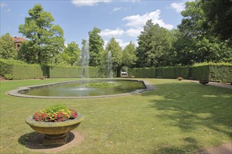 Fountain with flower decoration in the baroque garden, garden art, castle, Lichtenwalde,