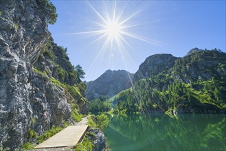 Hiking trail at Tappenkarsee, sun star, mountain lake, Stierkarkopf, Radstätter Tauern, landscape