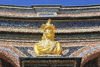 Gilded bust, facade, exterior walls, decorated, colourful, coloured stones, crystals and glass