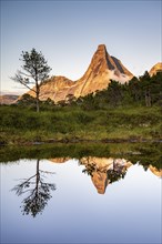 Norway's national mountain Stetind reflected in small lake, Tysfjord, Ofoten, Norway, Europe