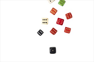 Group of different cubes with sixes and a one, white background, copying room