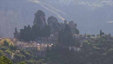 Backlight in the morning, Bizarre rocks, Mountain in the background, Cemetery, Militello Rosmarino,