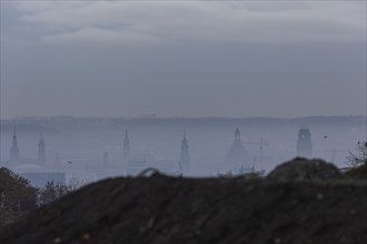 View from Dresden's Südhöhe of the city centre with its towers sinking into the fog