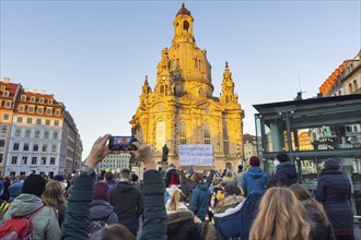 In Dresden, about 3, 000 people gathered on Neumarkt in front of the Church of Our Lady. On posters