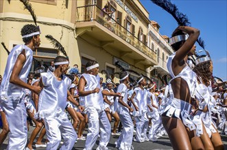 Costumed people celebrating Carnival. Mindelo. Cabo Verde. Africa