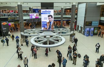 Passengers in central concourse in departures area, South Terminal, London Gatwick airport,