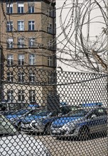 Parking police vehicles behind the security fence, police section 53, Berlin, Germany, Europe