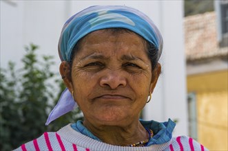 Portrait of grinning woman with headscarf. San Antao. Cabo Verde. Africa