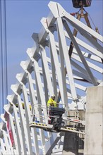 Assembly of the 105-metre-long light ring girder above the north stand of the Heinz Steyer Stadium