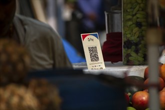 A Unified Payment Interface (UPI) barcode, or QR code, is kept at a stall for customers to make