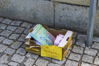 Used offer with toys on a street in Dresden Gruna