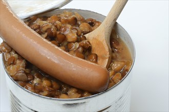 Lentil (Lens culinaris) dish and sausages in tin, lentil