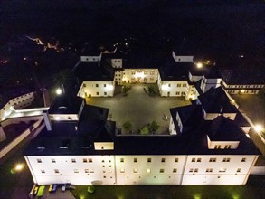 Augustusburg Hunting Lodge in evening illumination