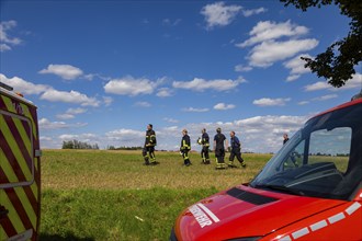 During controlled field fires, the firefighters were able to test various extinguishing methods,