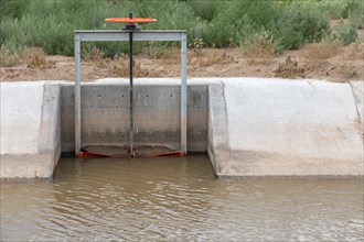 San Acacia, New Mexico, A gate on an irrigation canal allows water from the Rio Grande to be