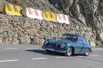 Oldtimer Classic Car historical vehicle Porsche 356 A T2 driving on north ramp of pass road