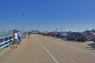 Den Helder, Holland, North Netherlands, August 2019: Cars and people waiting to board ferry to