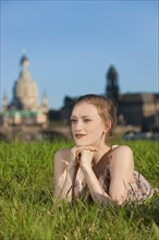 Young woman on the Elbe meadows in Dresden