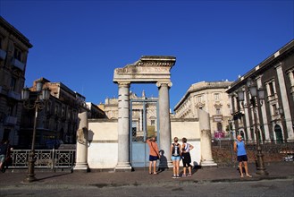 Amphitheatre, Roman, columns, entablature, tourists in front of entrance, blue cloudless sky,