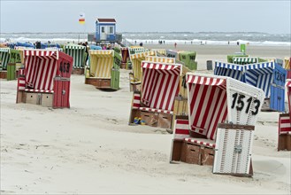 Empty beach chairs on a cool day in the early season on the beach of Langeoog, East Frisian