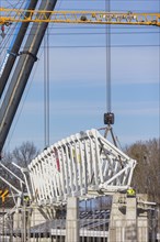 Assembly of the 105-metre-long light ring girder above the north stand of the Heinz Steyer Stadium