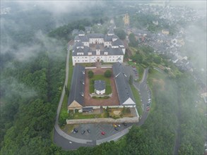 Augustusburg in fog and rain