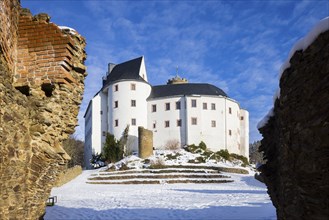 Scharfenstein Castle is a Spornburg on an elongated spur above the village of Scharfenstein