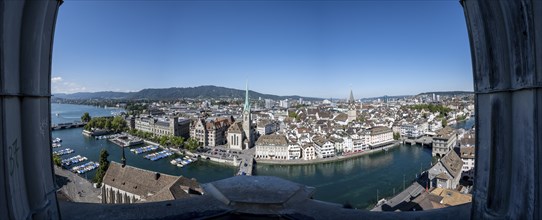 Panorama, view over the old town of Zurich with river Limmat, church Fraumünster and Münsterbrücke,