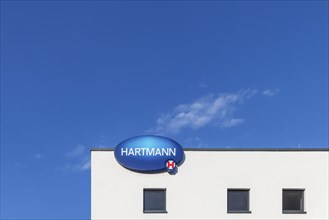 Hartmann Group with company logo on the building, company for medical products and care products,